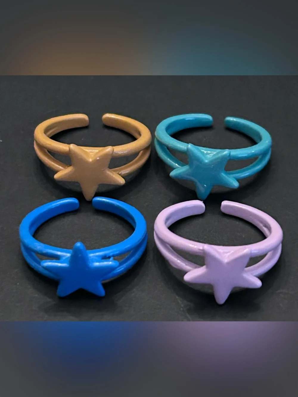 Kids Star Stackable Adjustable Rings Set of Four in Blue, Purple, Teal, Tan